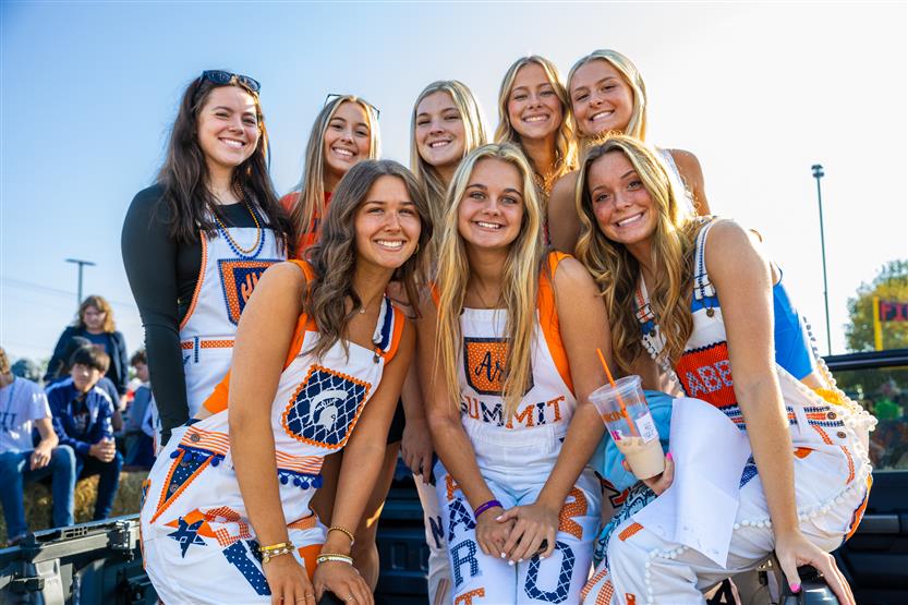 Students at the Summit High homecoming parade